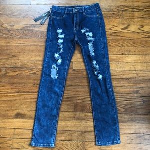 High-Rise Distressed Jeans